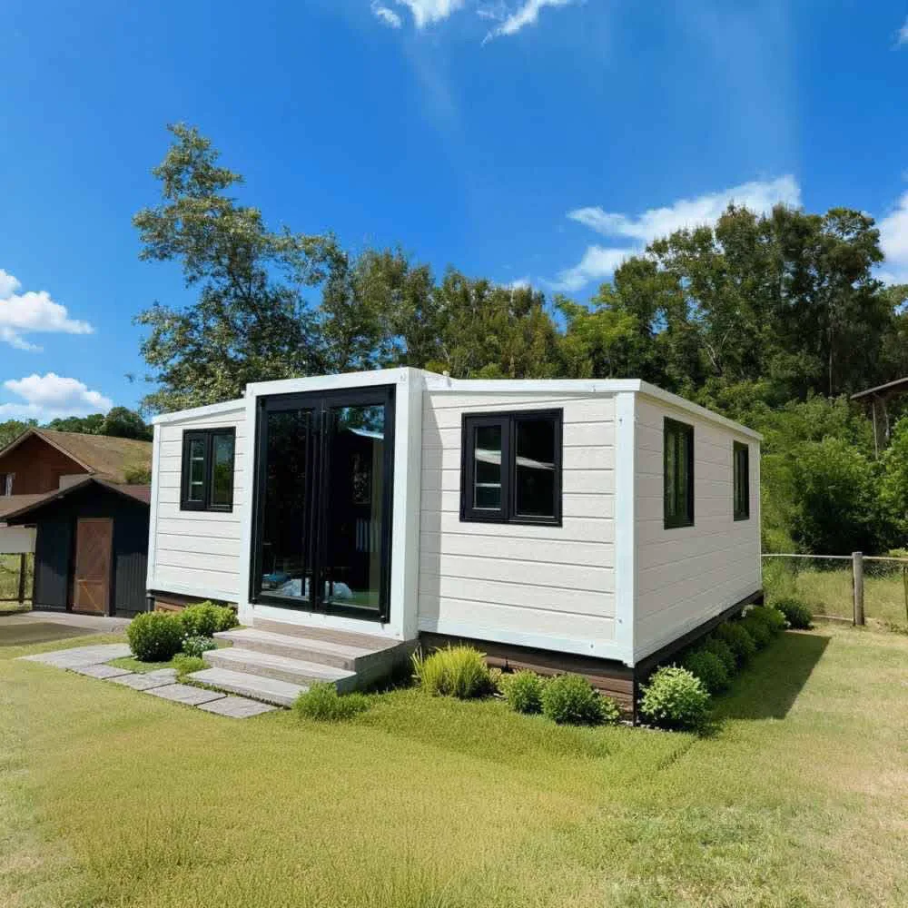 The Voyager, a white THiNQ unit with full-height glass doors on a lawn